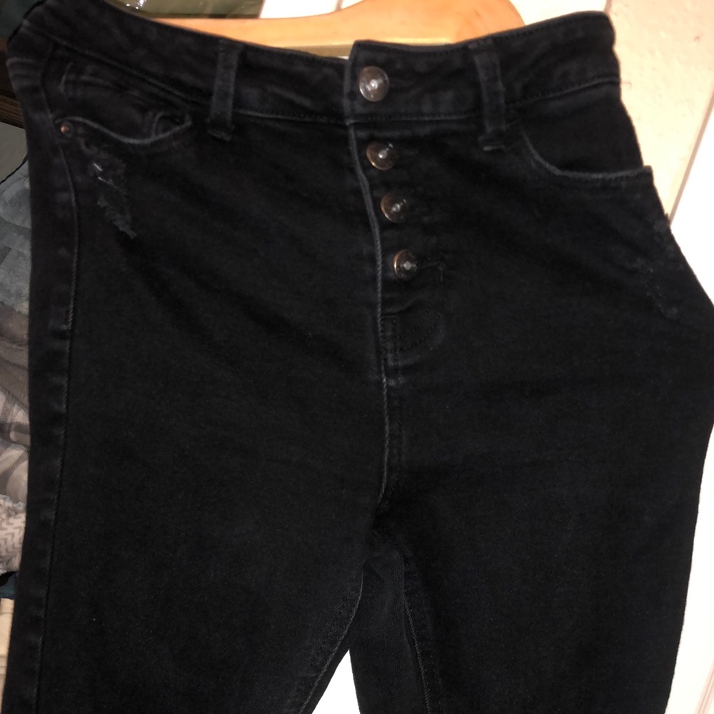 black ripped high rise skinny jeans